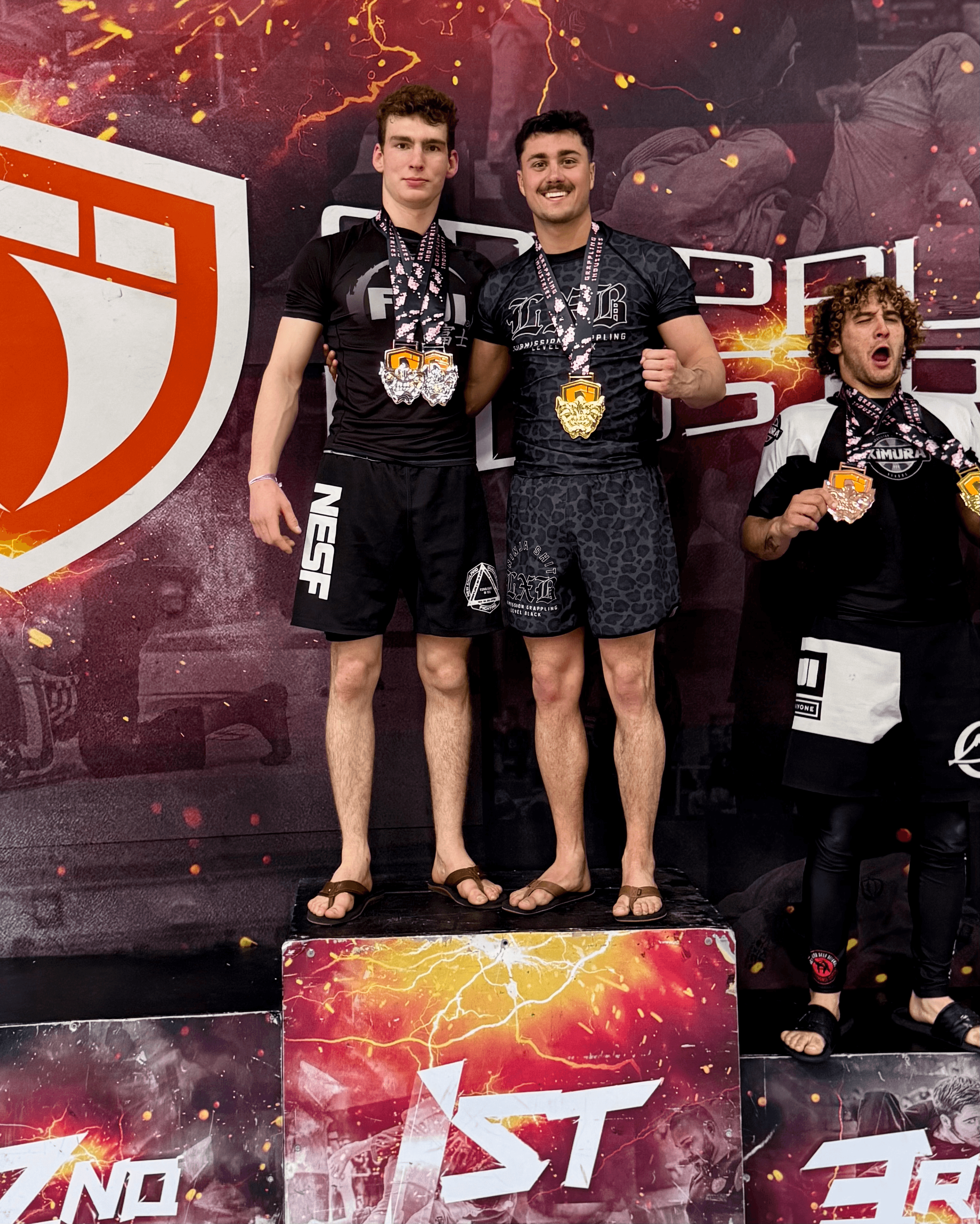 Two students on the on the 1st place podium after competition.