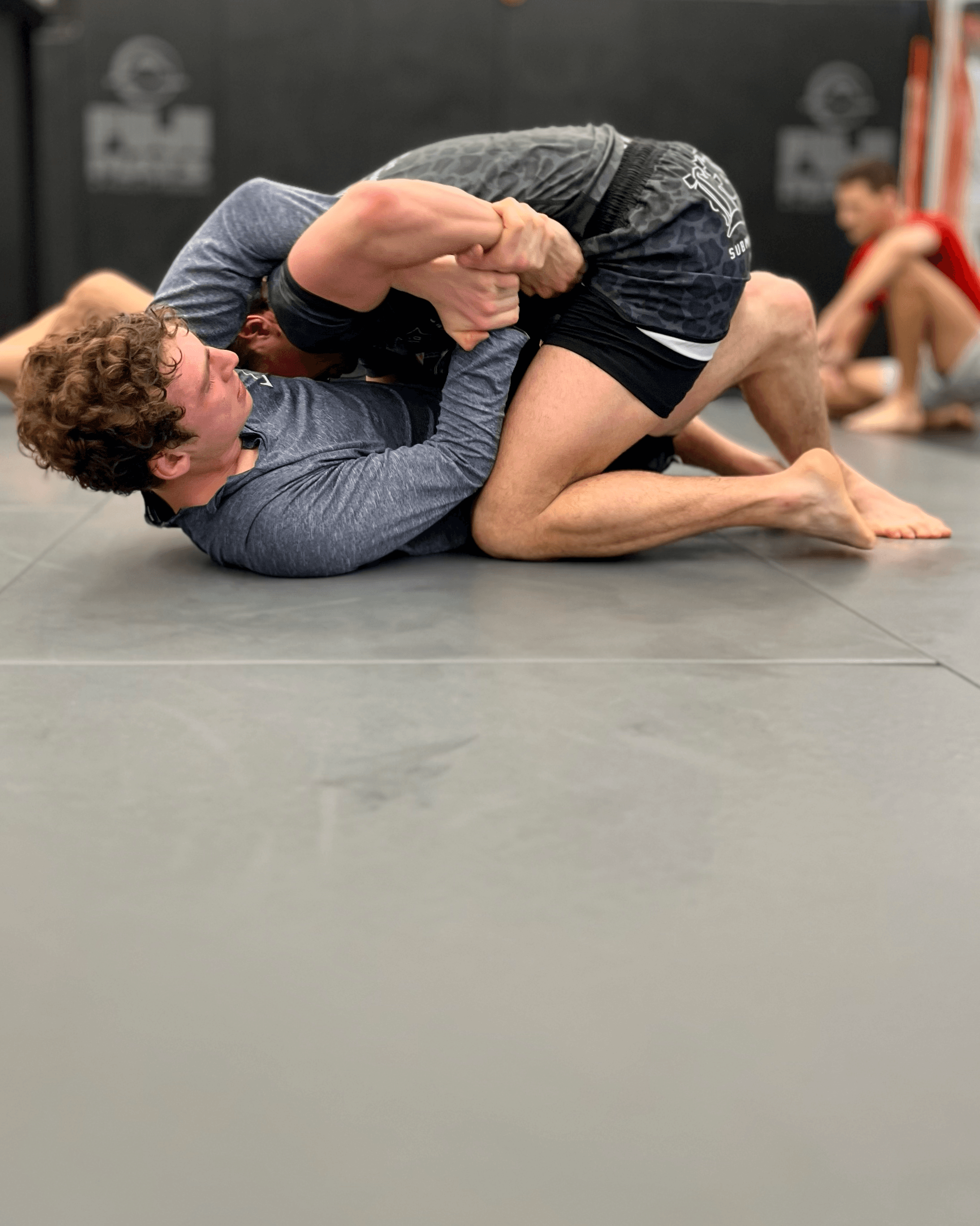 Students scrambling in Jiu-Jitsu